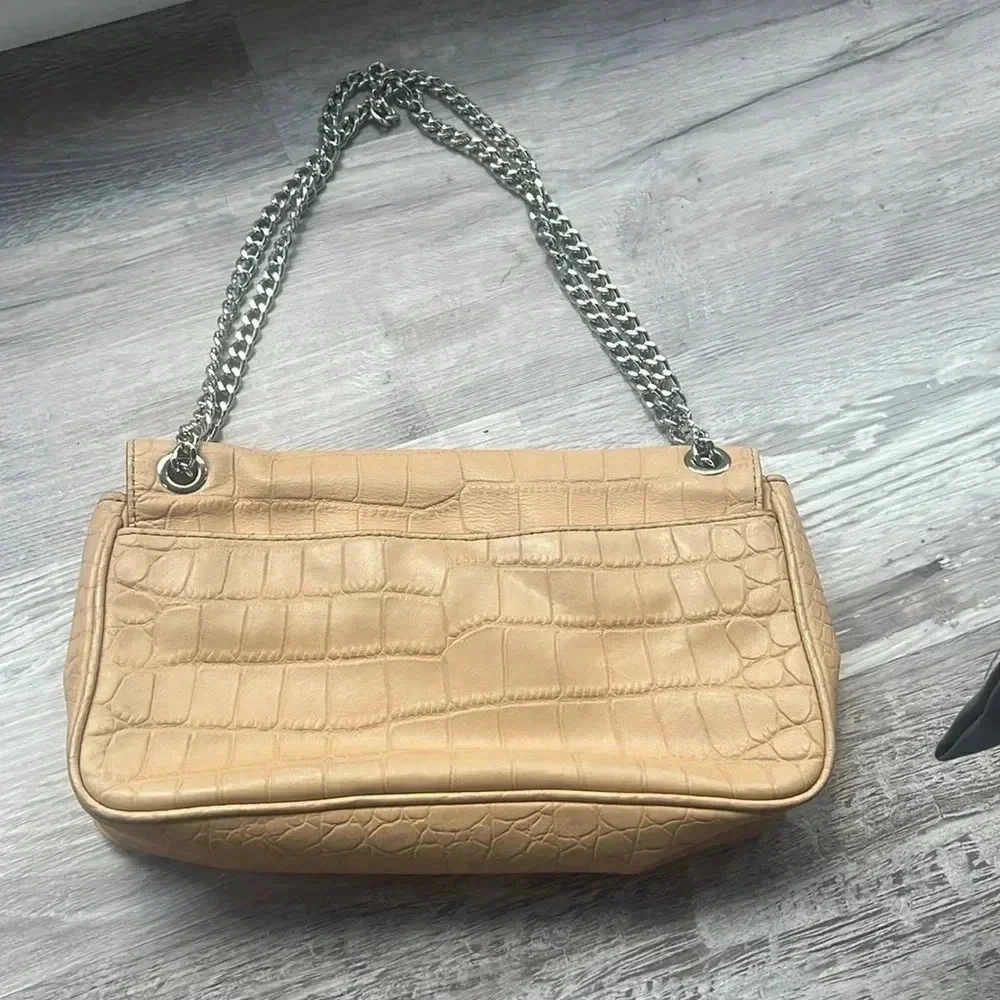 Tan Michael Kors envelope chain crossbody purse with adjustable straps